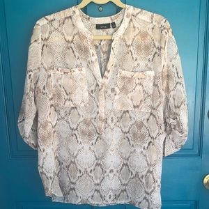 Gently worn sheer animal print blouse